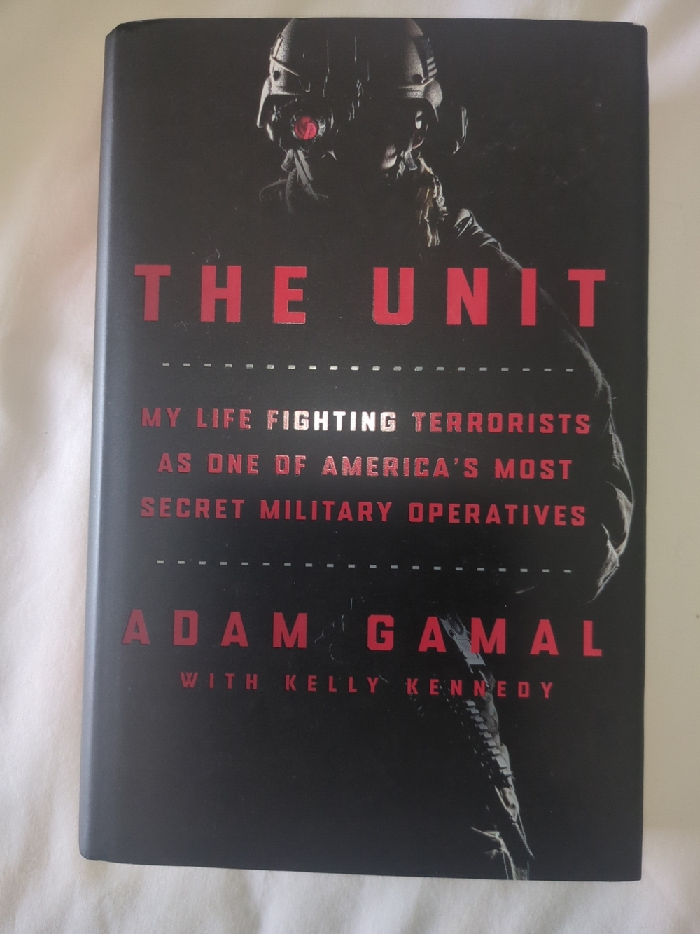 The Unit by Adam Gamal - Black and Red Hardcover Book